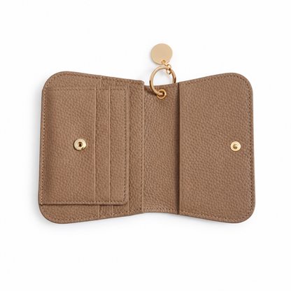 Leather keychain wallet open, showing card slots and snap closure